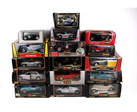 An assortment of boxed die-cast model vehicles. Including Burago Citroen, Maisto Special Edition Ford GT90, etc.