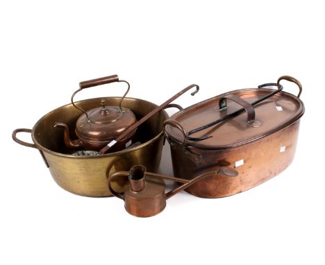 An assortment of brass and copper kitchenalia. Including a two handle copper fish kettle with cover, etc. Max. H28cm