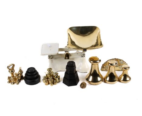 A set of vintage scales and an assortment of weights. The scales painted white and having a brass tray, H17cm
