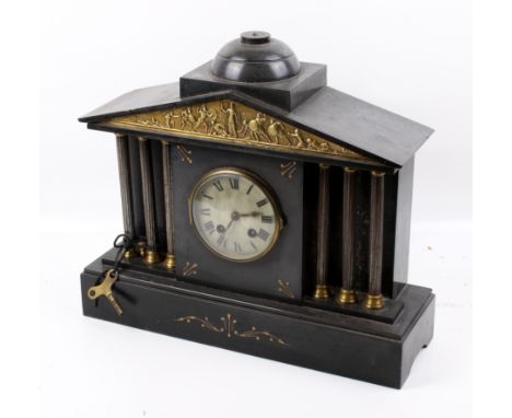 A Victorian brass and slate mantel clock. A brass pediment frieze of a Greek battle, Roman numerals, a HAC movement striking 