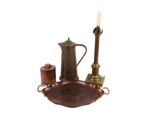 An assortment of metalware. Including a beaten copper flask, a copper lamp base, a copper tray with embossed decoration and b