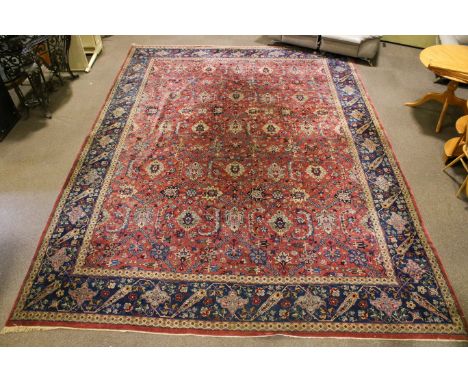 A large Zola Sarab traditional Persian style woollen rug with pink and turquoise ground. Having ornate floral border. 495cm x