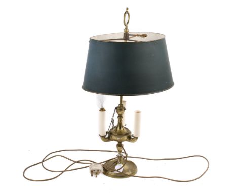 A brass table lamp. Having three branches and an adjustable metal shade. H65cm