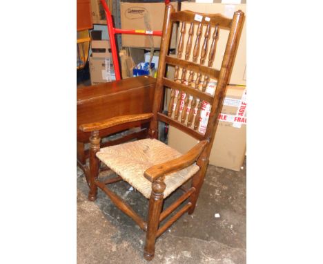 Victorian oak rush seated spindle back nursing chair, and a low dropleaf table