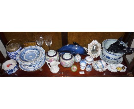 Shelf of blue and white Oriental and Chinese porcelain together with other ceramics and glassware, etc.