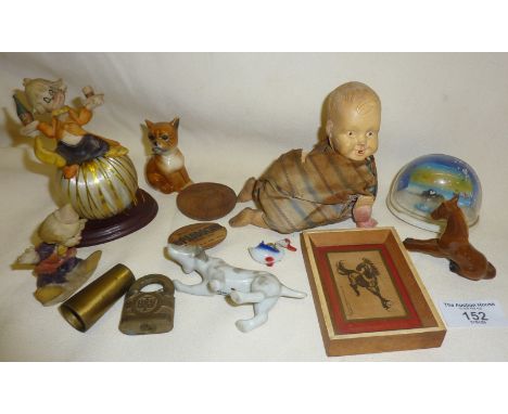 Japanese vintage automaton crawling celluloid baby doll, Epsom Derby day badge, Goebel dog, and other figurines, etc.