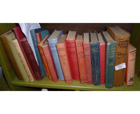 Shelf of hardback novels, inc. P.G. Wodehouse