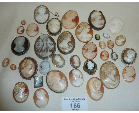 Large collection of assorted antique and vintage carved shell cameos, some with silver brooch settings, etc.