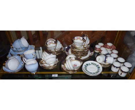 Shelf of tea ware, inc. Tuscan china, Copeland Spode, Aynsley Embassy pattern, Cauldon china, etc.