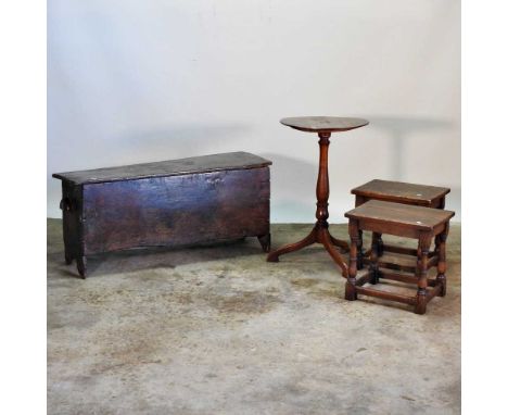 An 18th century oak six plank coffer, 106cm wide, together with a pair of oak joint stools and a tripod table (4)