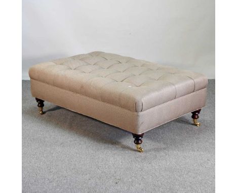 A modern tan upholstered footstool, on turned legs125w x 80d x 42h cm