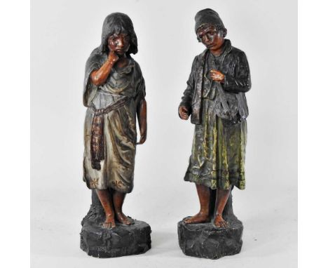 A 19th century German/Austrian Goldscheider style terracotta figure of a musician, together with another of a peasant child, 