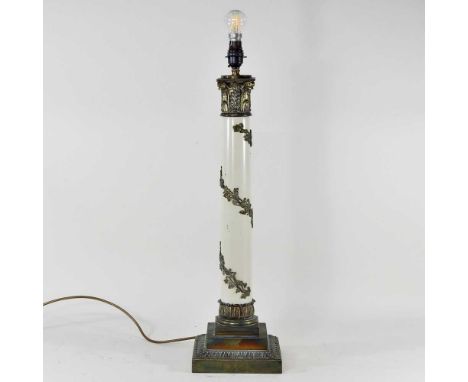 A large brass mounted table lamp, in the form of a column, 66cm highOverall condition looks to be complete but worn, with lig