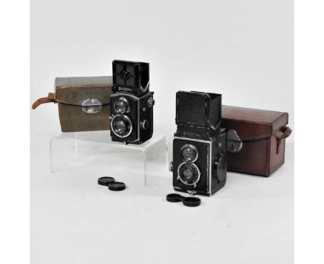 A mid 20th century Rolleiflex camera, Franke &amp; Heidecke Braunschweig, No.247459, with Carl Zeiss lenses, cased, together 