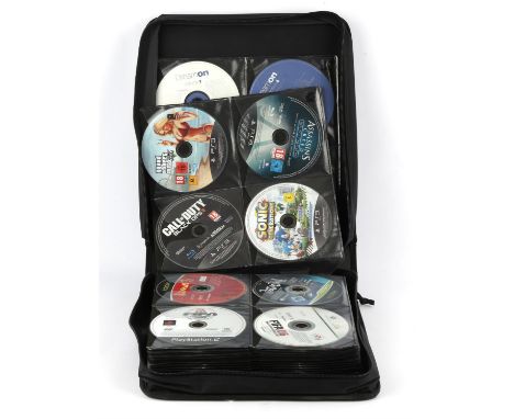 A large CD wallet case containing 32 PlayStation 1 (PS1) game discs and 23 PlayStation 2 (PS2) (PAL) PS1 games include: Crash
