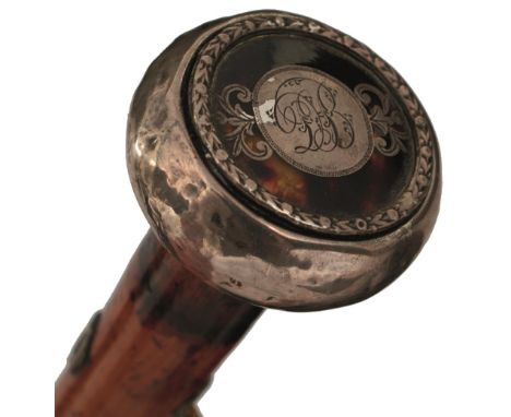 A 19TH CENTURY SWORD STICK, the white metal and tortoiseshell pommel engraved with the initials DB, bamboo and twine bound ha