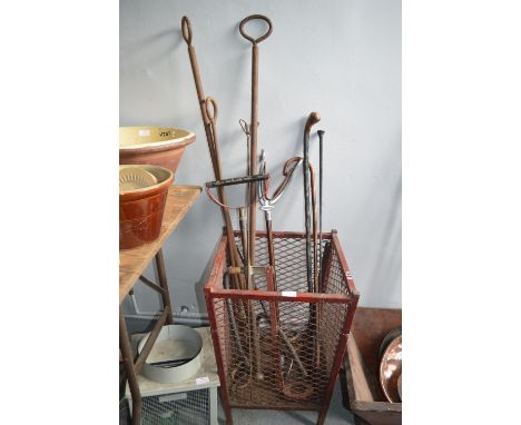 Metal Basket and Contents of Shooting Stick, Walking Canes, etc.  