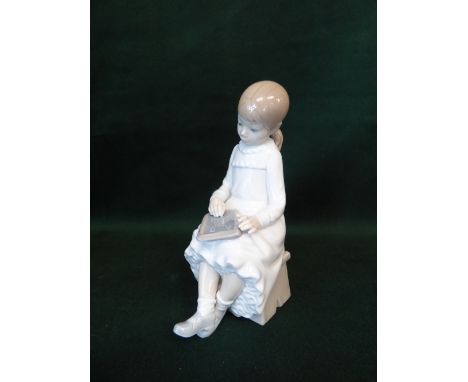 Nao figure of a young girl on a stool