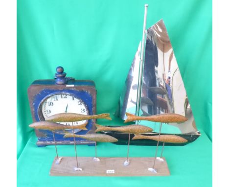 Decorative painted mantel clock, and decorative sculpture of shoal fish and model of wooden boat