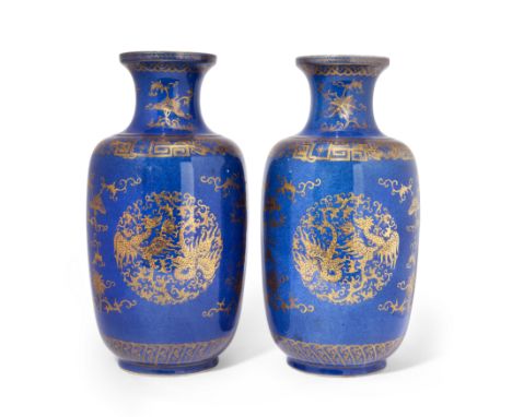 A pair of Chinese powder blue-glazed gilt-decorated vasesQing dynasty, 19th centuryEach gilded with archaistic stylised phoen