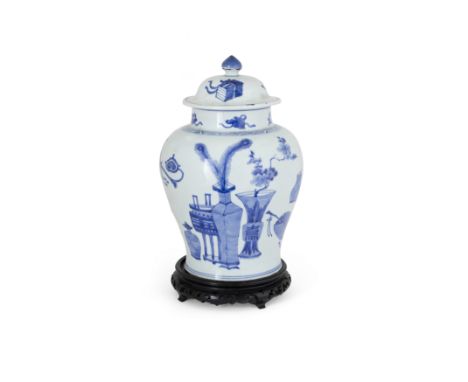 A large Chinese blue and white 'precious vessels' jar and coverQing dynasty, Kangxi periodDecorated to the exterior with vari