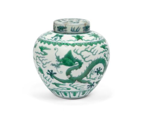 A Chinese green-enamelled 'dragon' jar and coverRepublic period, apocryphal Qianlong seal markPainted and enamelled with drag