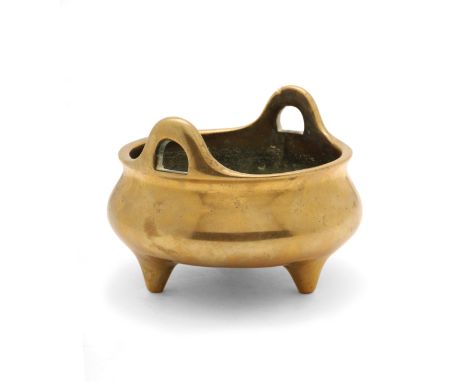A Chinese bronze tripod incense burnerQing dynasty, 18th century, apocryphal Xuande markOf bombe form with high loop handles 
