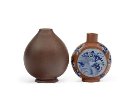 Two Chinese Yixing snuff bottlesLate Qing dynastyThe first, enamelled blue with landscapes and floral motifs, the base enamel