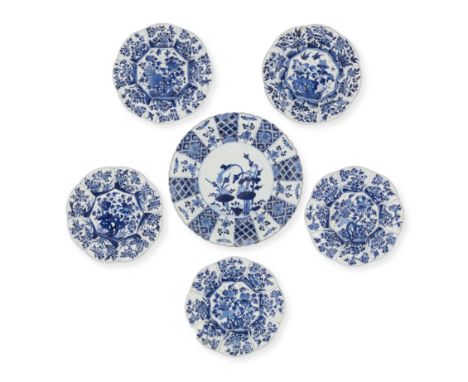 A Chinese blue and white 'lotus pond' plate and five moulded 'floral' platesQing dynasty, Kangxi period and 19th centuryThe K