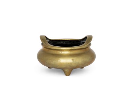 A Chinese bronze tripod incense burnerLate Qing dynasty, apocryphal Xuande markOf typical form, with upright loop handles, th
