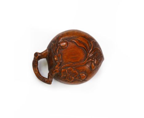A small Chinese peach-shaped carved bamboo 'prunus' washerQing dynasty, 18th/19th centuryCarved and pierced as a hollowed out