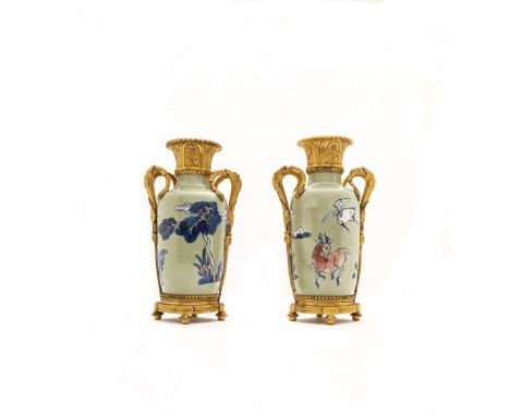A pair of Chinese underglaze blue and copper red ormolu mounted rouleau vasesQing dynasty, Kangxi periodDecorated with deer a