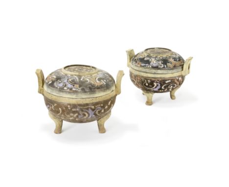 A pair of Chinese painted pottery covered tripod ritual food vessels, dingHan dynastyEach of typical form with domed cover an
