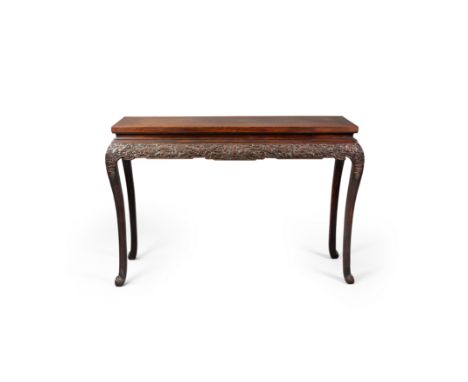 A Chinese rosewood painting tableRepublic periodThe rectangular top above carved frieze decorated with dragons amidst clouds,