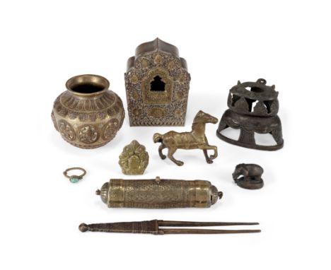 A group of nine Asian metal ware19th centuryComprising a Tibetan copper shrine with white metal cover decorated with mahakala