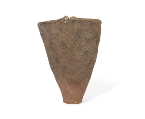A large Japanese conical vaseJomon period, 5000-1500 BCEImpressed with asymmetric design to the exterior, 37.5cm high. Proven