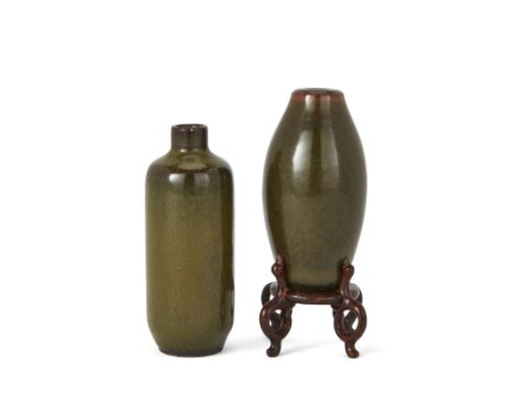 Two Chinese tea dust-glazed snuff bottlesQing dynasty, one Qianlong mark and periodComprising an olive stone-shaped bottle, t