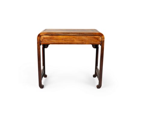 A Chinese rosewood tableRepublic periodThe rectangular top above frieze drawer on square legs to inverted scroll feet, 81.5cm