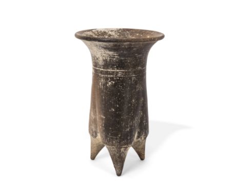 A Chinese Neolithic burnished pottery tripod vessel, Li, Xiajiadian cultureNeolithic period, Circa 1500 BCEWith flared rim ab