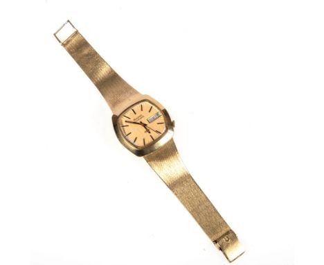 Goldene Herrenarmbanduhr- BULOVA- ca. 1970-1975 750er Gelbgold. Milanaise-Goldarmband mit Sicherheitsschließe. Modell Accutro