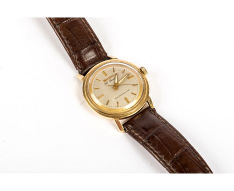 Armbanduhr Bulova-Vintage ca. 1970 585er Gelbgold, Automatic, Ø 3,2 cm. Mit Lederarmband.