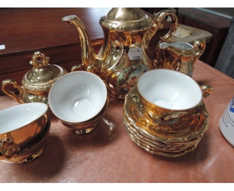 A German gilt miniature tea service