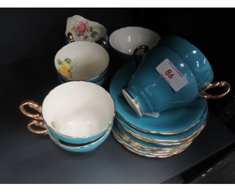 A vintage tea service, having blue and floral decoration