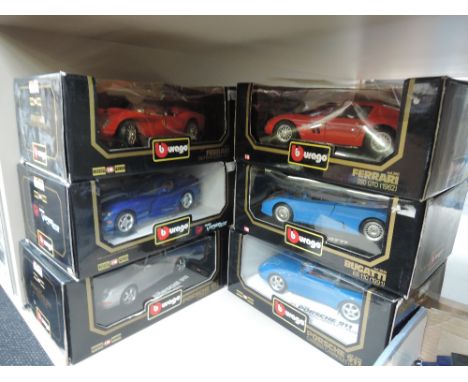 Six Burago 1:18 scale die-cast sports cars, all in window display boxes