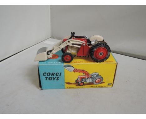 A Corgi Toys die-cast MF65 tractor with shovel, in original box 53