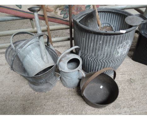 A vintage dolly tub, carpet beater etc