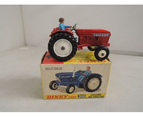 A Dinky die-cast Leyland 384 Tractor, in original box 308
