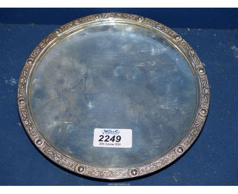 A Silver footed Tray having Celtic zoomorphic/animal border, London 1946, 8" diameter, 300 gms.