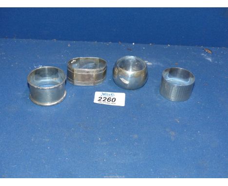 Four Silver Napkin rings (two engine turned), Birmingham 1926 and Birmingham 1948, Sheffield 1911 and London (hallmarks rubbe