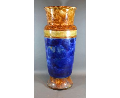 A Royal Doulton Stoneware Stick Stand of shaped tapering form with mottled blue and green ground, 62 cms tall 